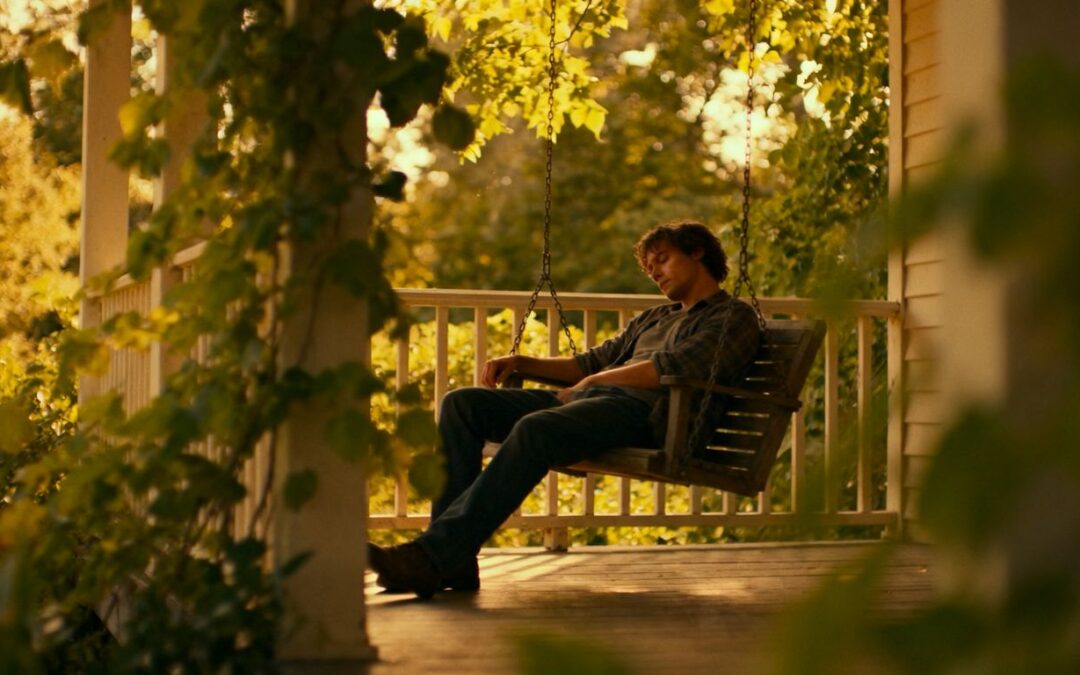 Tired caregiver finding peace in a summer garden.